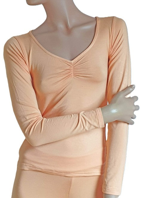 Yoga T-Shirt in Pfirsich, Langarm. Hergestellt aus 92 % Bambus Stoff